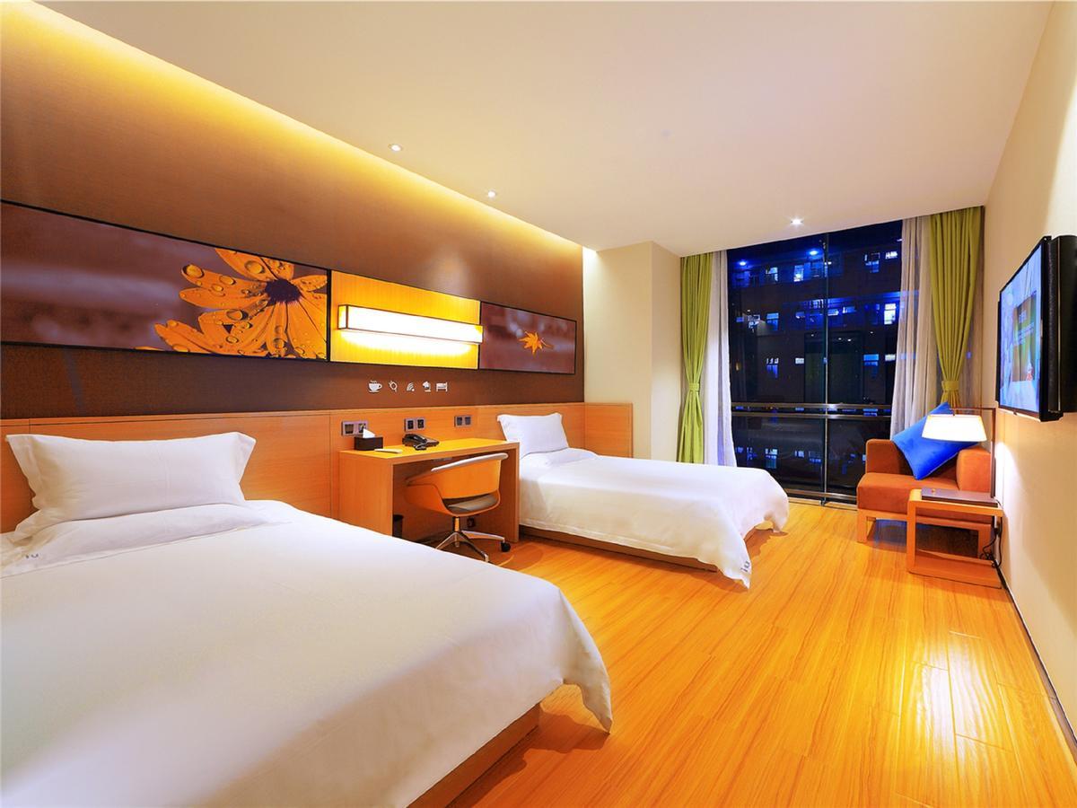 Iu Hotel Zhanjiang Haibin Avenue Xinhaimingchen מראה חיצוני תמונה