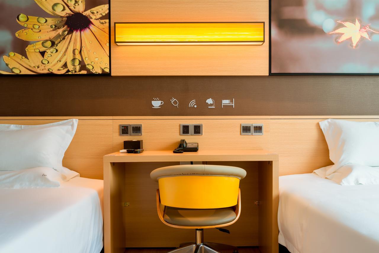 Iu Hotel Zhanjiang Haibin Avenue Xinhaimingchen מראה חיצוני תמונה